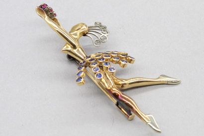 null 18K (750) yellow and white gold brooch stylized with a ballerina holding a garland...