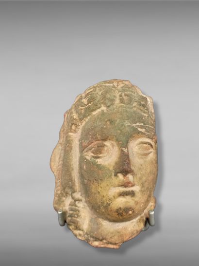 Fragment of a female statuette with English...