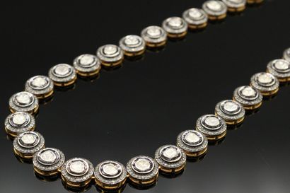 null Gold-plated silver necklace, articulated with 38 polki diamonds surrounded by...
