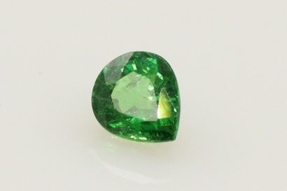 null Garnet tsavorite pear on paper. 

Accompanied by an AIG certificate dated January...