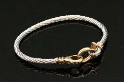 null FRED

Force 10 bracelet, steel wire and clasp in 18K (750) gold. 

Signed. 

French...