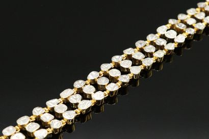 null Silver ribbon bracelet articulated with 65 polki diamonds. 

Indian work of...