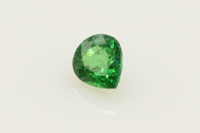 null Garnet tsavorite pear on paper. 

Accompanied by an AIG certificate dated January...