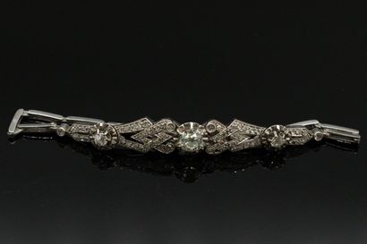 null 
Bracelet in platinum, decorated with geometrical motifs set with old cut diamonds...