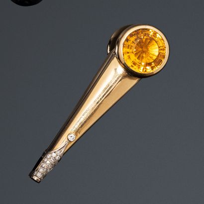 Pendant in 18K (750) gold representing an...