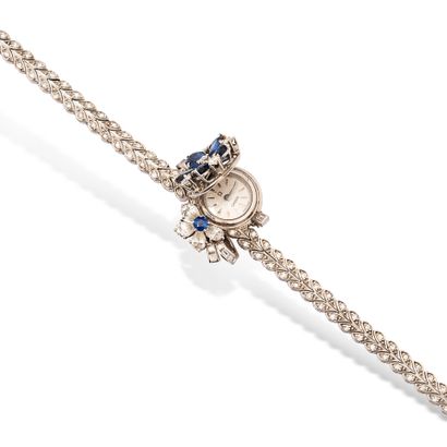 null OMEGA

Montre bracelet de dame en or gris 18K (750), le cadran recouvert d'un...