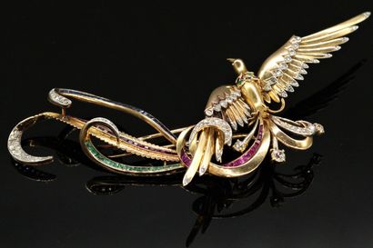 null 18K (750) gold lapel clip depicting a bird of paradise, the wings set with rose-cut...