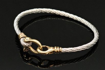 null FRED

Force 10 bracelet, steel wire and clasp in 18K (750) gold. 

Signed. 

French...