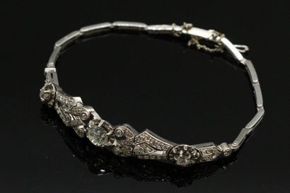 
Bracelet in platinum, decorated with geometrical...