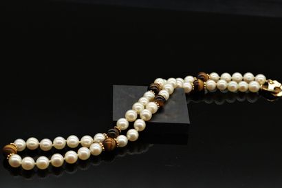 null DINH VAN

Necklace of cultured pearls with tiger eye beads and beaded ferrules...