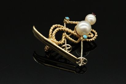 null Brooch in 14K gold wire (585) twisted and smooth drawing a skier, decorated...