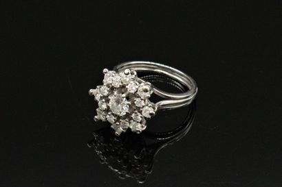 White gold and platinum ring, set with round...