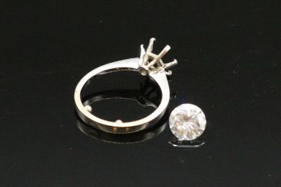null Bague en or gris 18K (750) et platine, ornée d'un diamant rond de taille brillant...