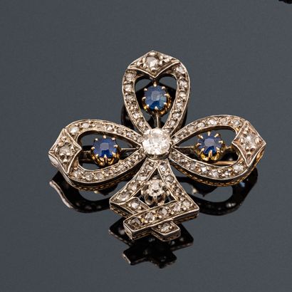 Silver and 18K (750) gold clover brooch,...