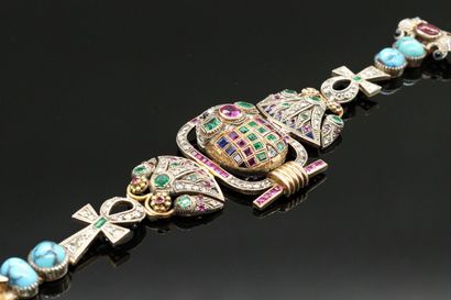 null 
Egyptian style bracelet in 9K (375) gold and silver, decorated with a scarab...