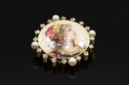 null 18K (750) gold brooch, decorated with a polychrome enamelled miniature representing...