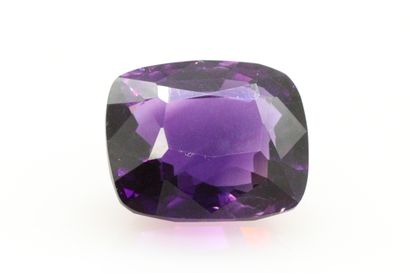 null Cushion amethyst on paper. 

Weight : 29.50 cts.