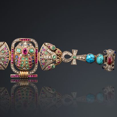 null 
Egyptian style bracelet in 9K (375) gold and silver, decorated with a scarab...