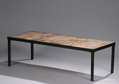 null Roger CAPRON (1922 - 2006) 

Coffee table with a blackened wrought iron structure...