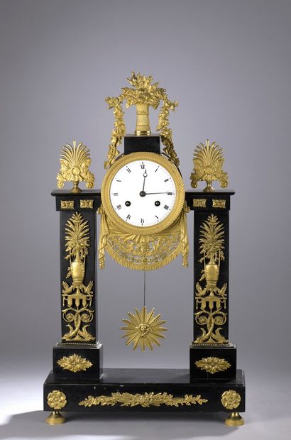 Portico clock in black marble and gilded...