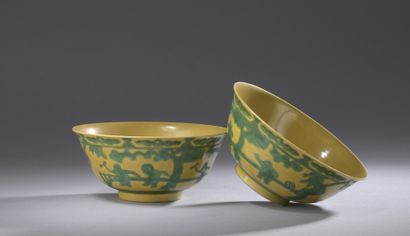 null CHINA

A pair of green enamelled porcelain bowls on a yellow background with...