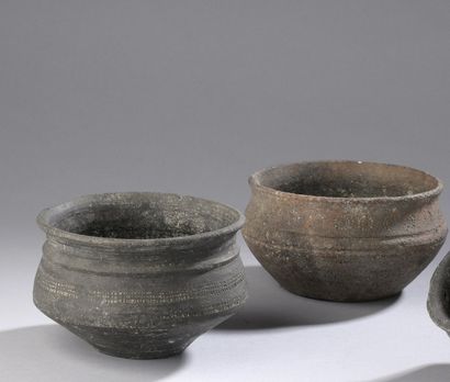 null Set of two bowls with carinated body and concave lip. They are adorned with...