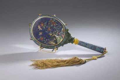 null CHINA - 20th century

Gilt bronze and polychrome cloisonné enamel hand mirror...
