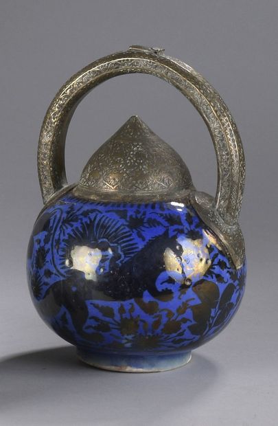 null Safavid ceramic with Qajar mounts

Siliceous paste with cobalt glaze painted...