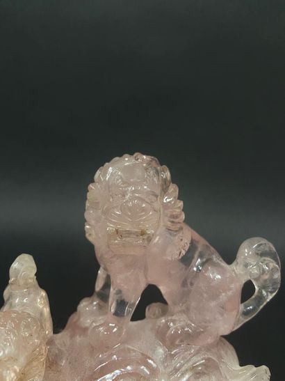 null Group carved in pink quartz representing lions in relief.

China, 20th century

H....