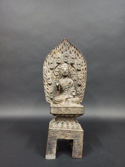 null Funerary stele in cast iron representing a buddha in front of a mandorla engraved...