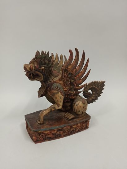 null INDONESIA, Bali

Statuette of Singha in carved wood and polychrome resting on...
