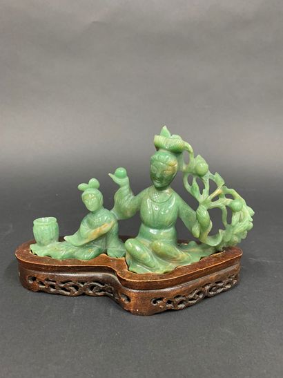null Group in green hard stone, woman with a flowering branch and her child

with...