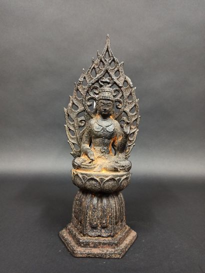 null Funerary stele in cast iron representing a Buddha sitting on a base in the shape...