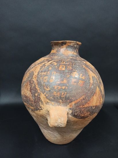 null Jar with two handles in terra cotta with polychrome slip.

China, Neolithic...
