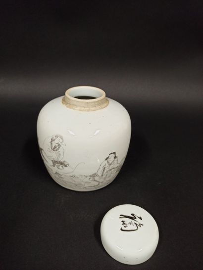 null Small porcelain covered pot decorated with wise men discussing fish.

China,...