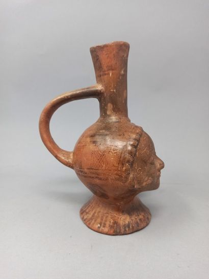 null Vase with long neck in beige and brown terra cotta, the body formed of two Janus,...