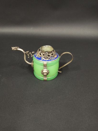 null Small teapot composed of a central element in jade, silver and enamel.

Modern...