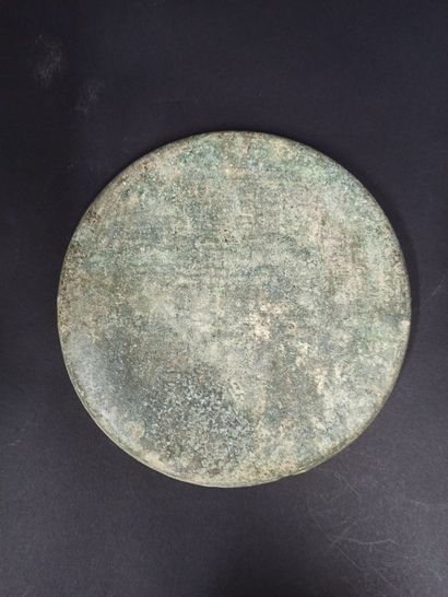 null Bronze gong with excavation patina

Cambodia

Diam. 16 cm