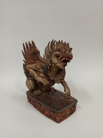 null INDONESIA, Bali

Statuette of Singha in carved wood and polychrome resting on...