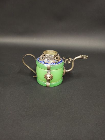 null Small teapot composed of a central element in jade, silver and enamel.

Modern...