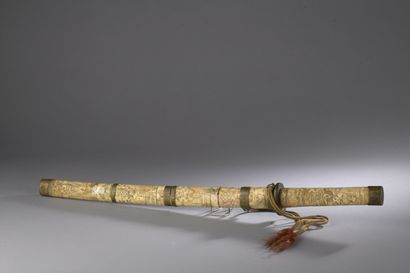 null Child's sword, scabbard and wrist in carved bone with characters.

Japan, early...