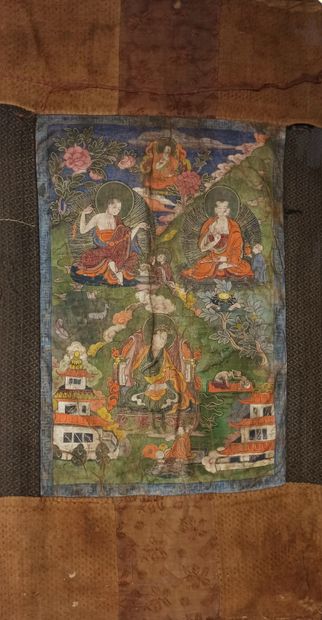 null TIBET - 19th century

Tangka, distemper on canvas, seated lama in the center,...
