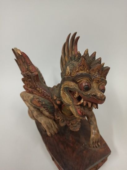 null INDONESIA, Bali

Statuette of Singha in carved wood and polychrome resting on...