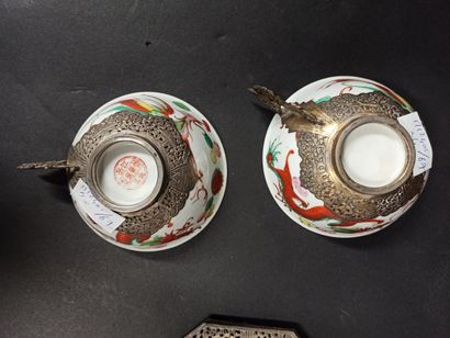 null Pair of porcelain cups and saucers decorated with phoenix and dragons, silver...