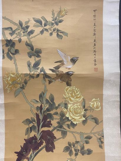 null Scroll painting representing a couple of birds on a rosebush.

Ink and color...