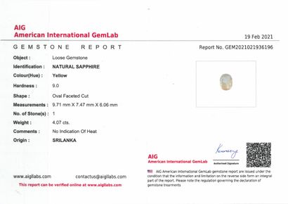 null Oval yellow sapphire on paper.

Accompanied by an AIG certificate indicating...