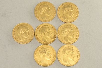 null Lot of seven gold coins of 20 francs Napoleon III bare head. (1852 A x 2 ; 1855...