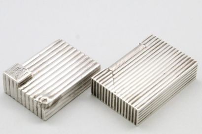 null CARTIER & MAQUET

Lot of two silver lighters including : 

- a lighter with...