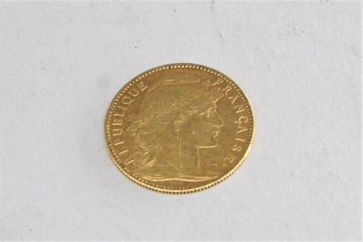 Pièce en or de 10 francs Coq (1901). 
TTB...
