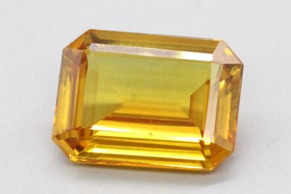 null Lot of two synthetic orange sapphires rectangular cut on paper. 

Weight : 25.65...